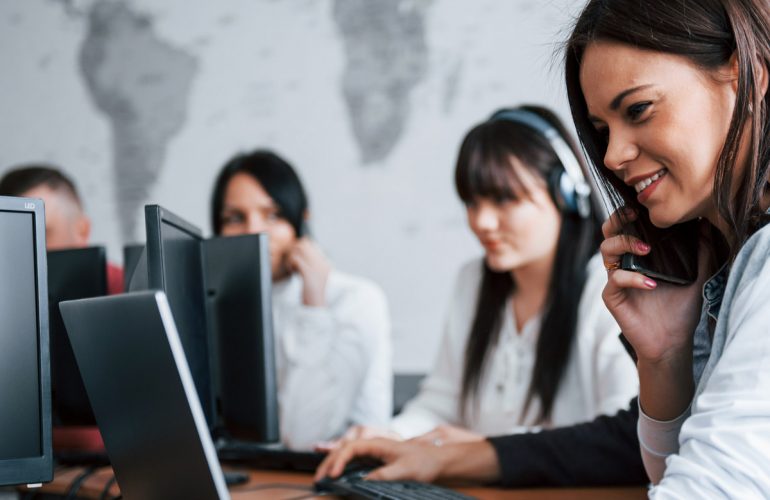 call center reps on the computer