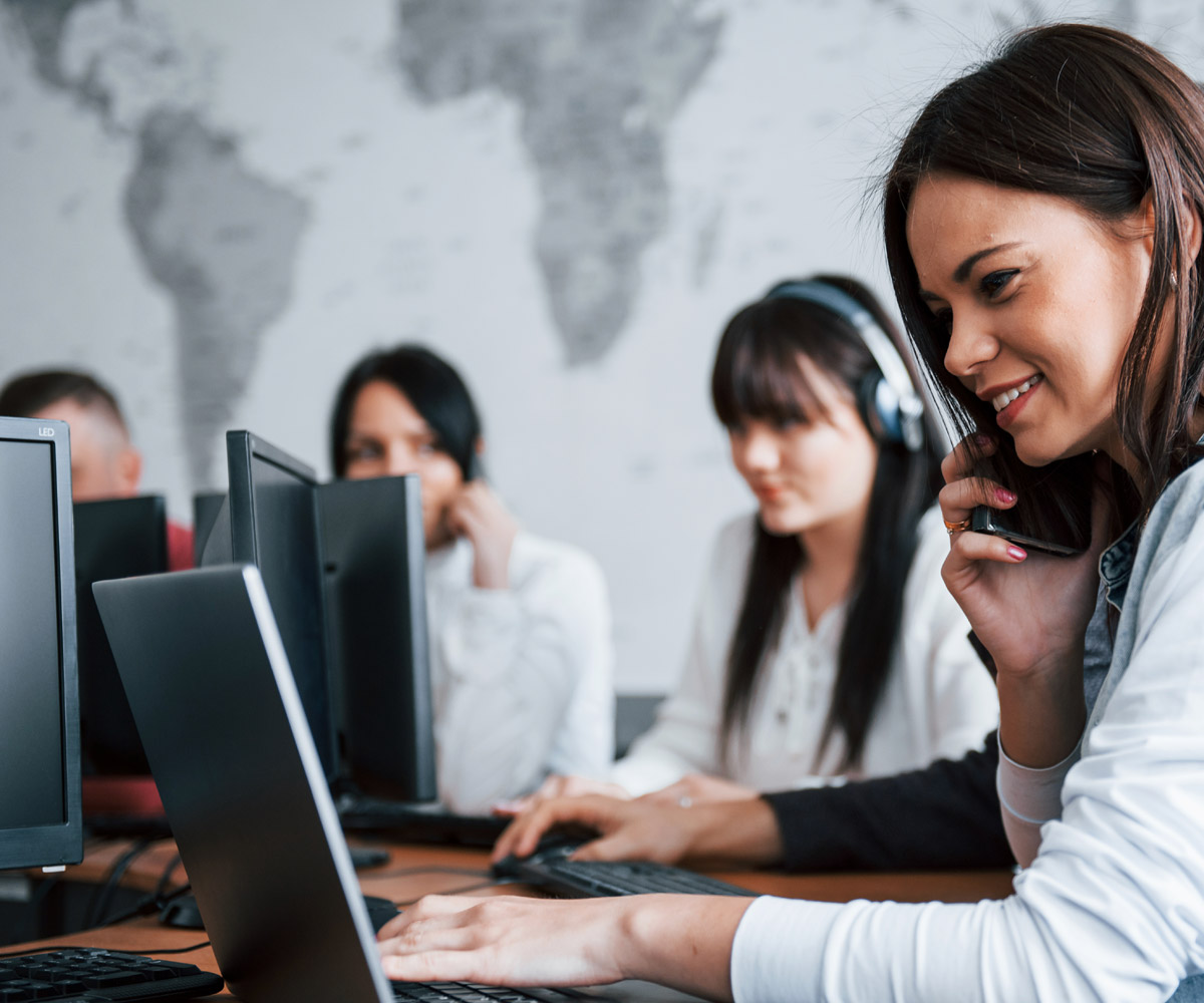 call center reps on the computer